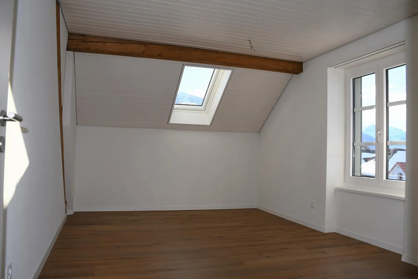 Charmante Dachwohnung - Foto 3 von 7