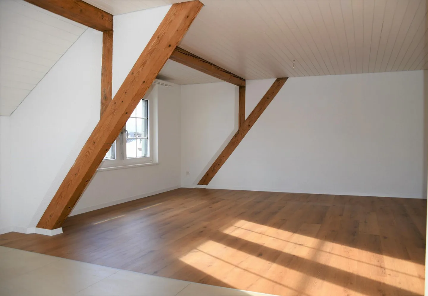 Charmante Dachwohnung - Foto 4 von 7