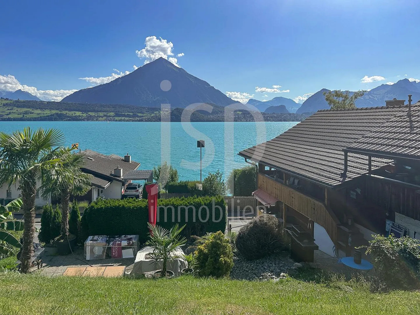 Maison avec deux appartements au bord du lac - Photo 4 sur 15