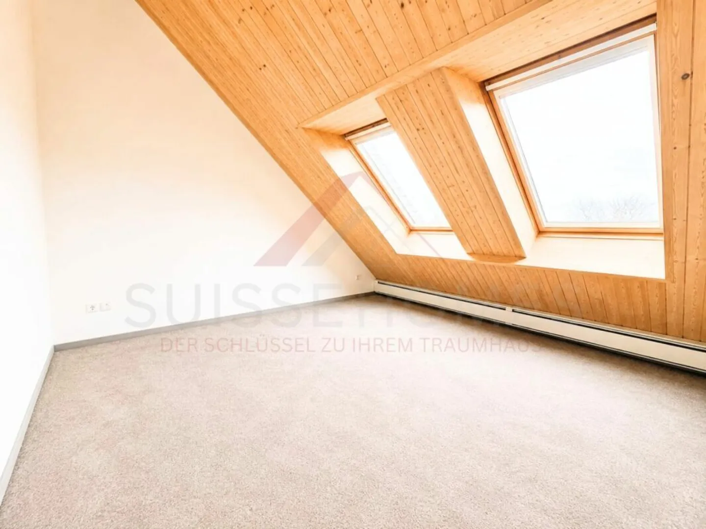 Spacious 4.5-room maisonette apartment with gallery and fireplace in 8603 Schwerzenbach - Photo 10 of 15