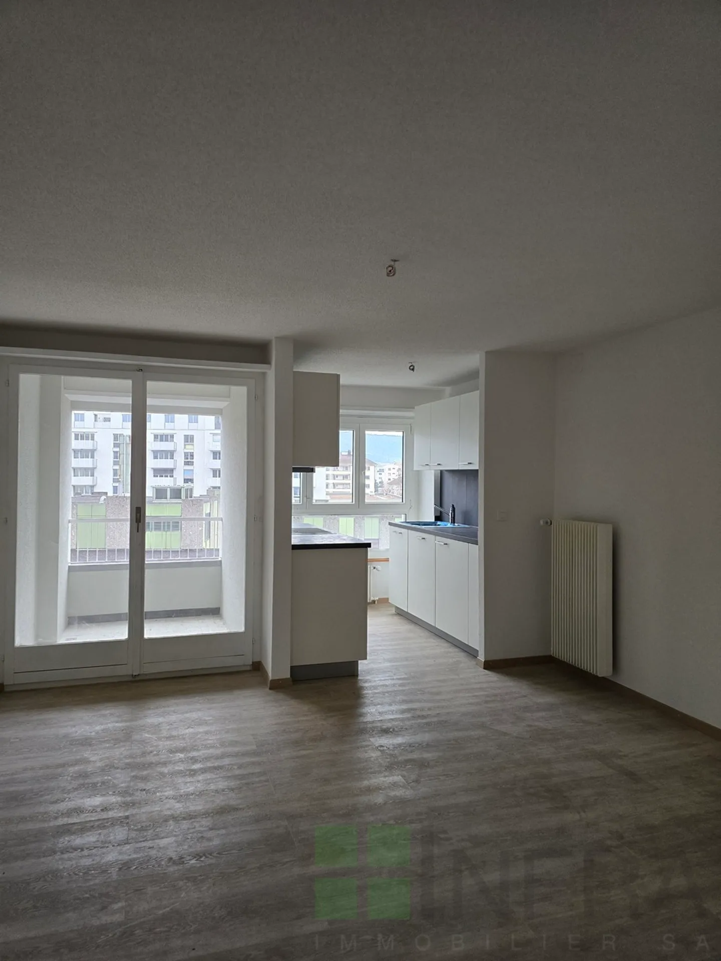 Appartement rénové en centre-ville - Photo 3 sur 7