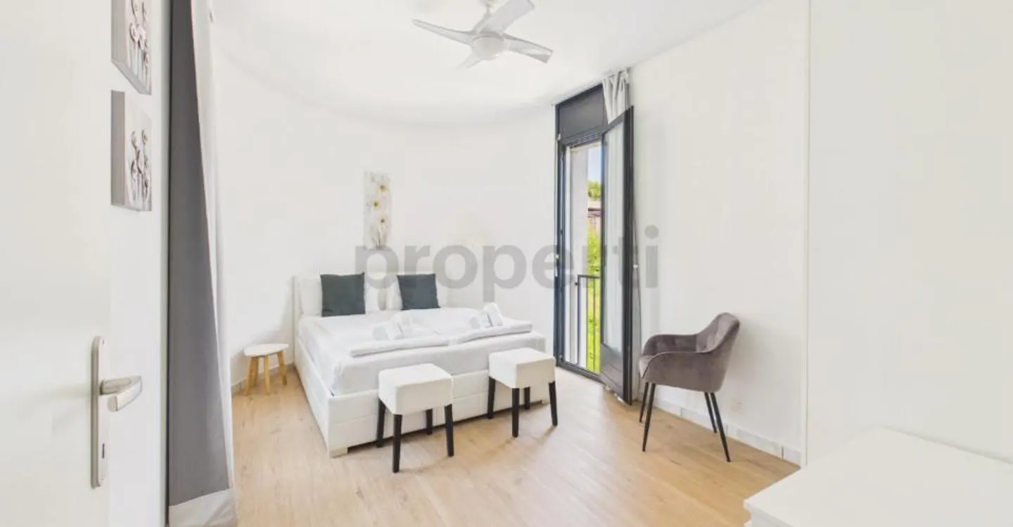Lugano: elegant 3.5 rooms with two balconies and two parking spaces in a well-maintained residence - Photo 7 of 13