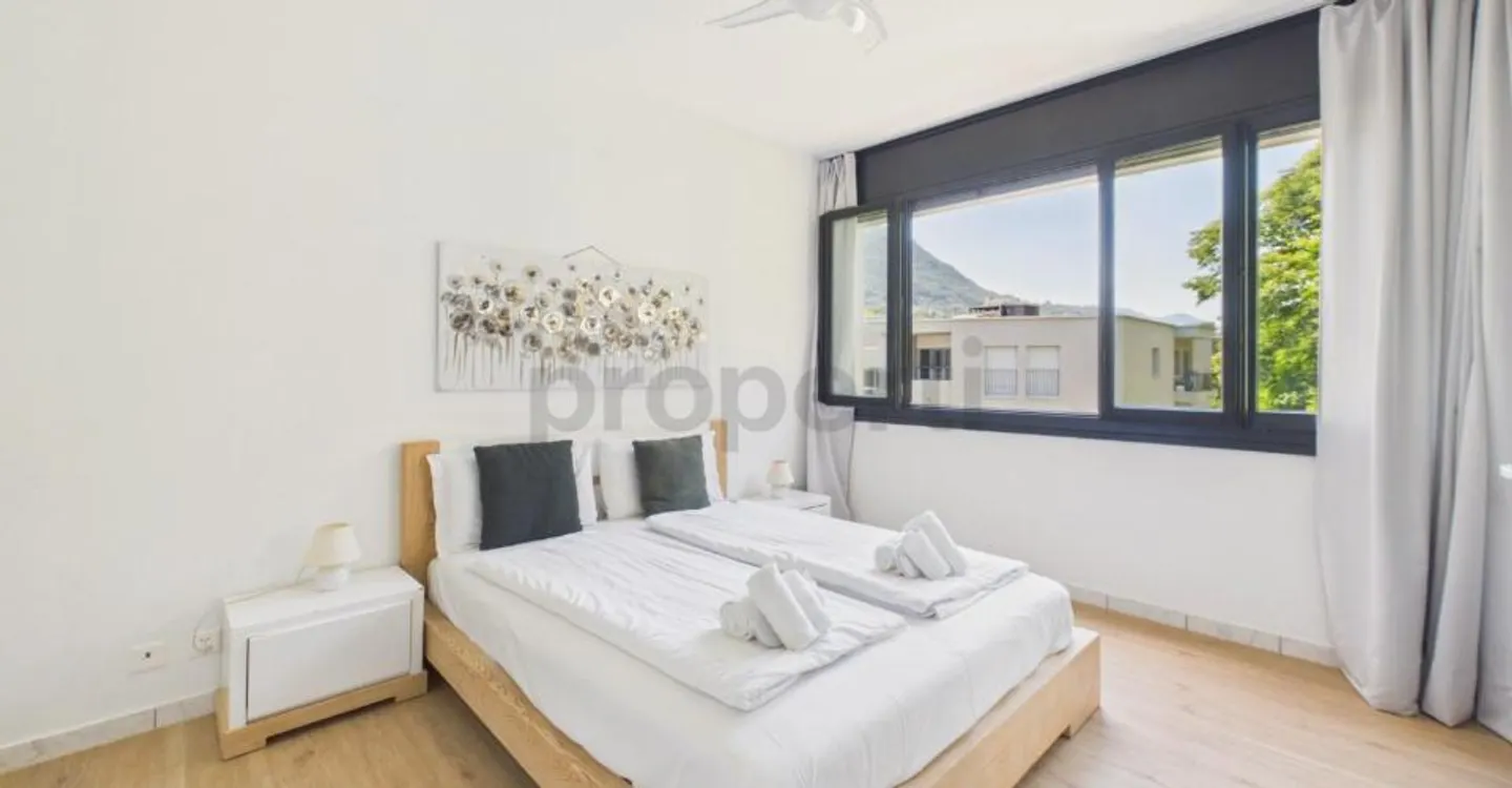 Lugano: elegant 3.5 rooms with two balconies and two parking spaces in a well-maintained residence - Photo 6 of 13