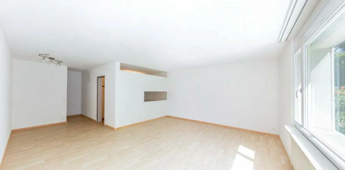 Appartement en rez-de-chaussée ensoleillé avec patio - Photo 2 sur 9