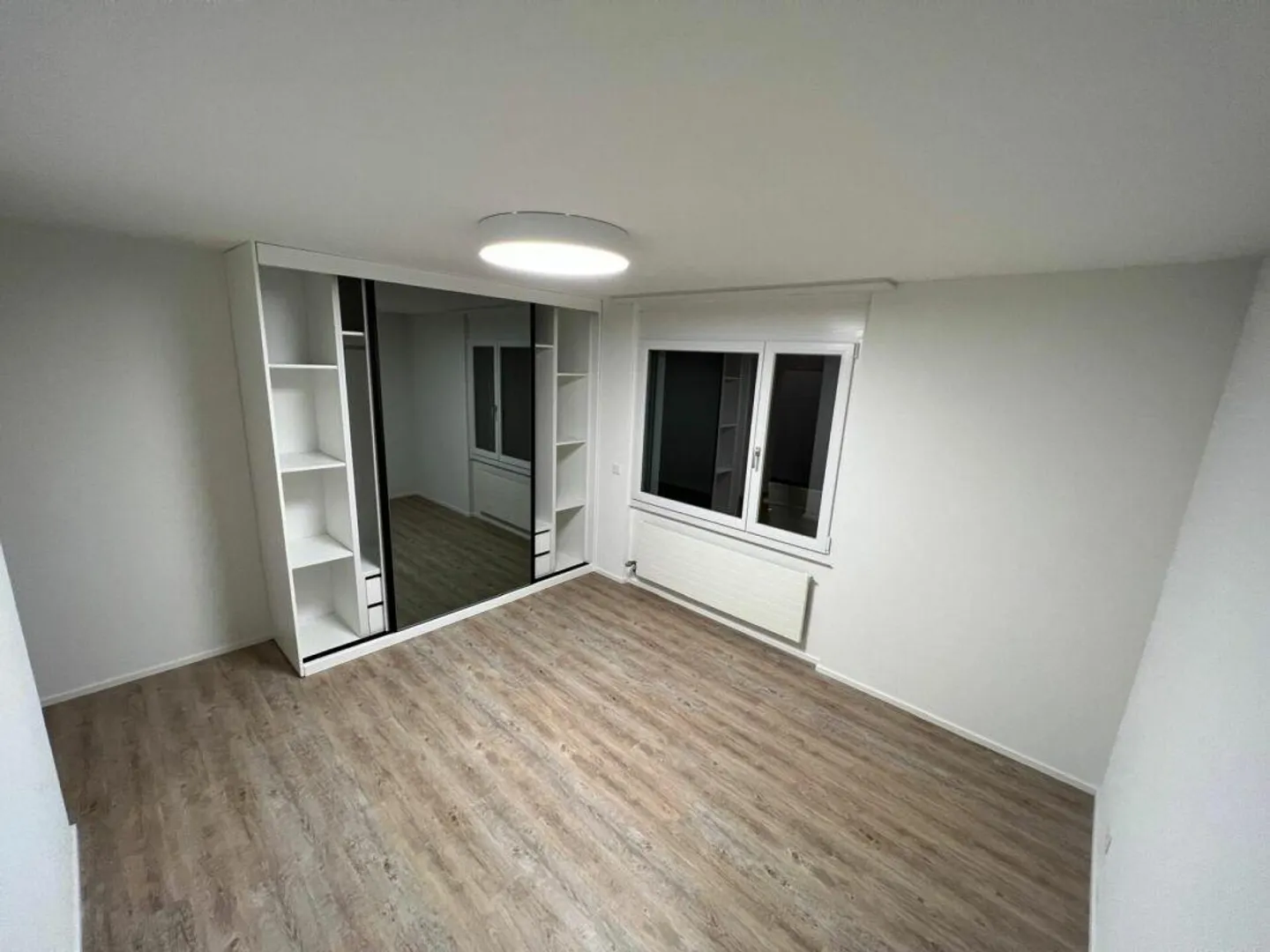 Appartement en rez-de-chaussée ensoleillé avec patio - Photo 7 sur 9