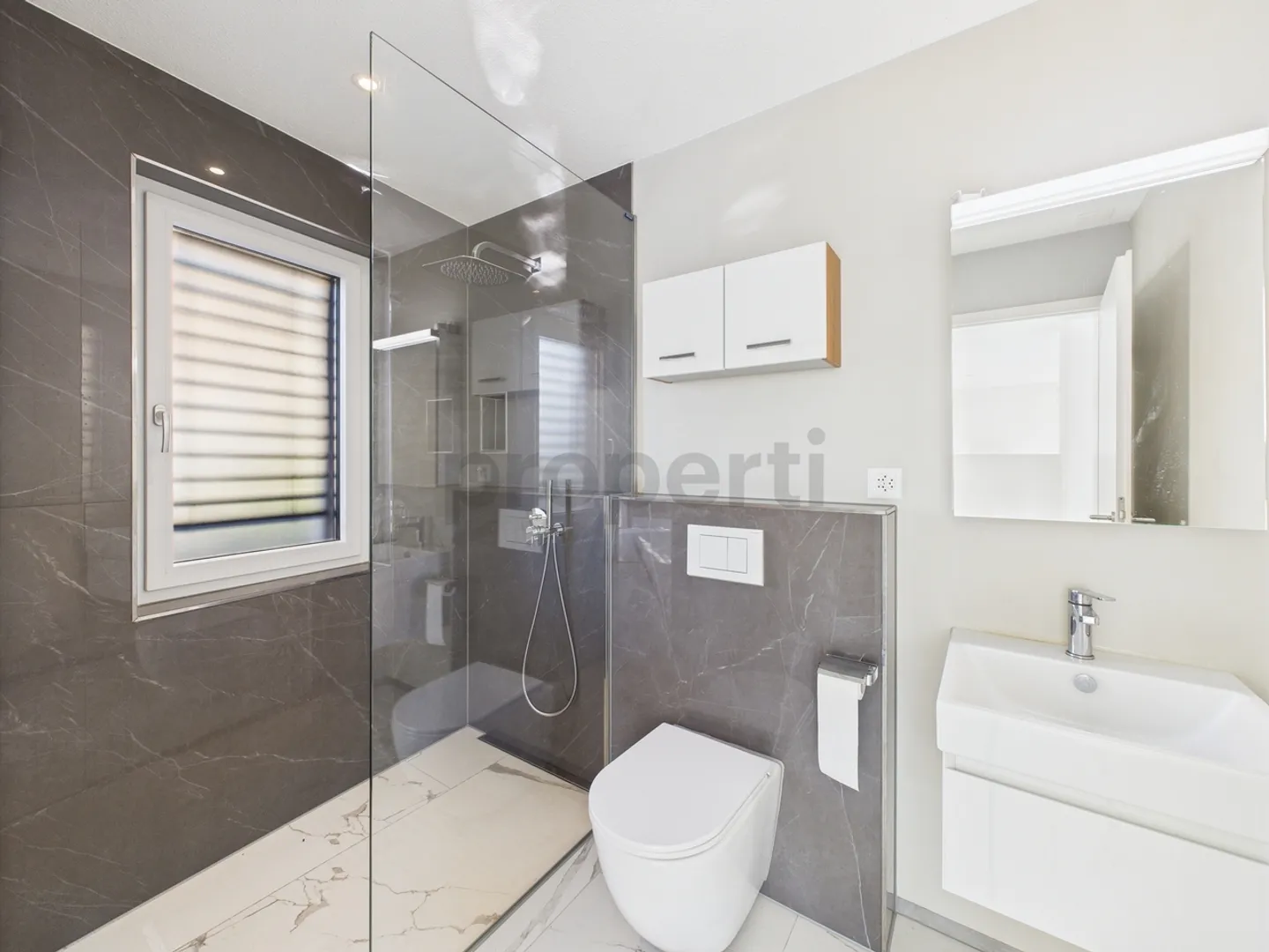 Family-friendly single-family home with sunny garden and modern design in Urdorf - Photo 10 of 12