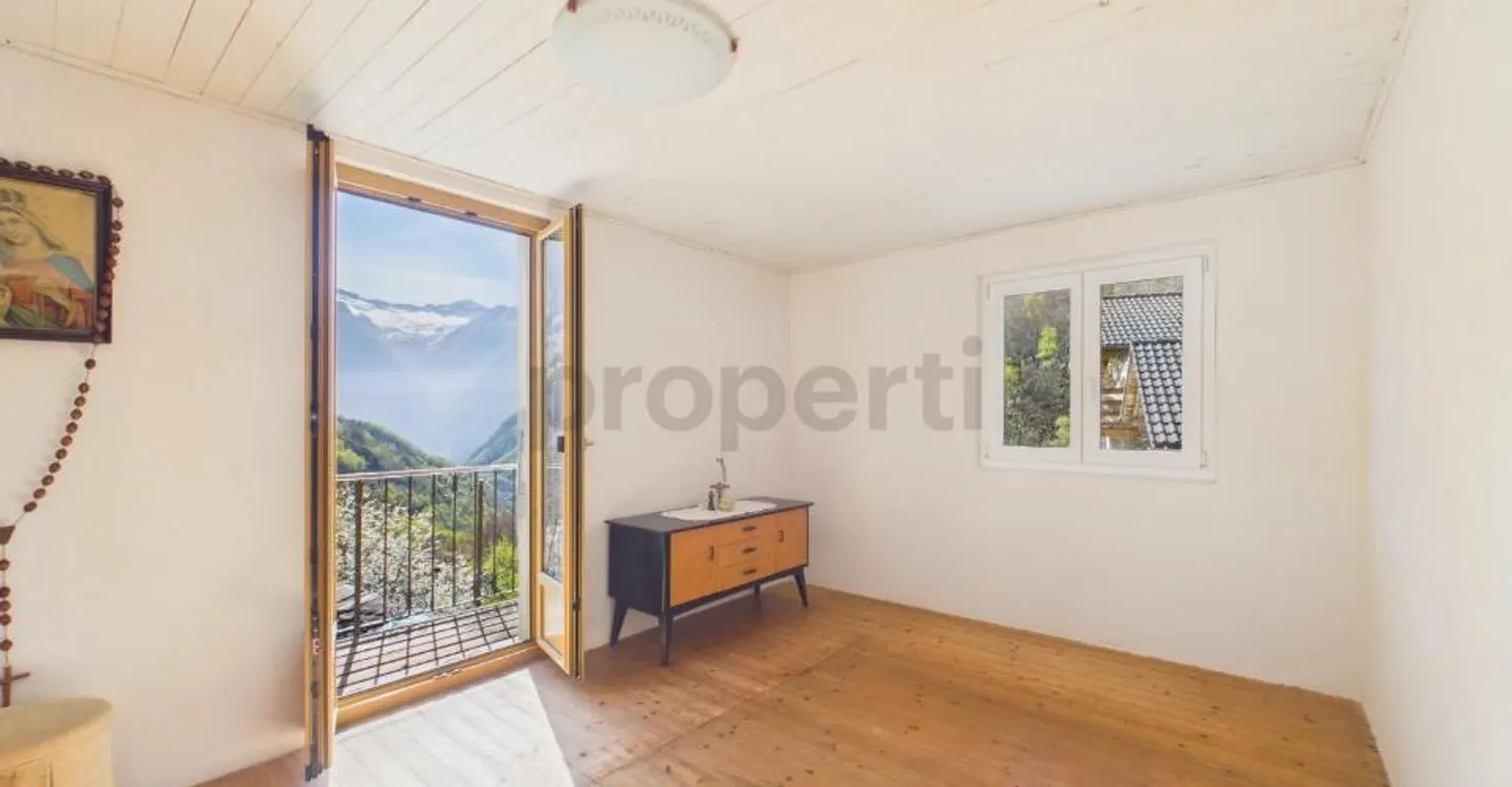 Detached house with grain loft, garden, panoramic view MAIN AND SECONDARY RESIDENCE IN VAL CALANCA - Photo 8 of 12