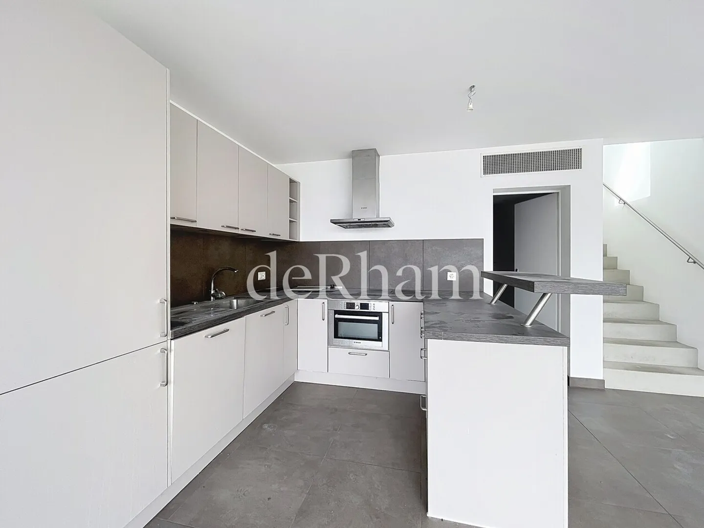 Wunderschönes 4,5-Zimmer-Tripex mit Seeblick, Terrasse und privatem Garten! - Foto 3 von 11