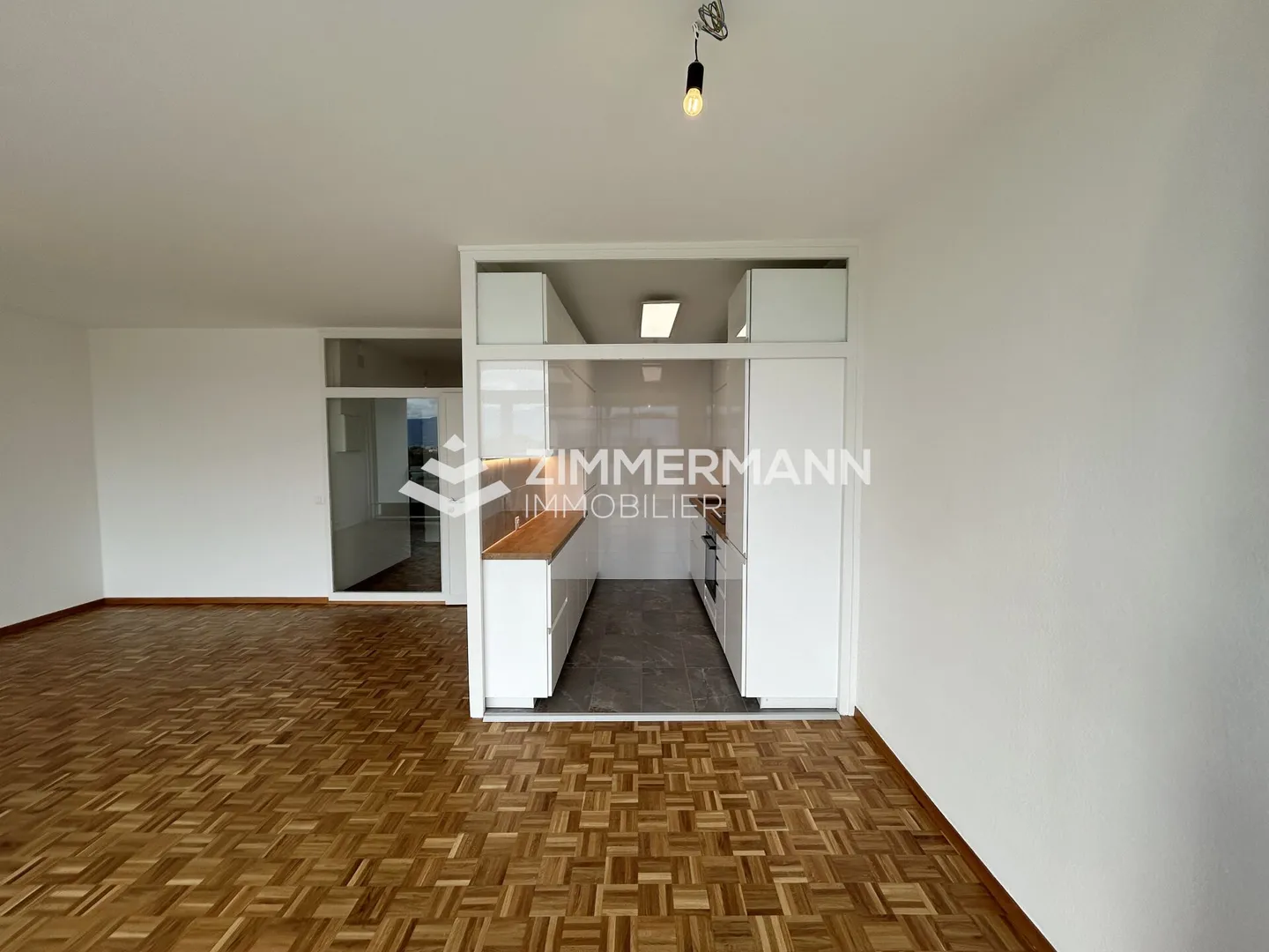 Spacieux 5 pièces en étage élevé avec balcon à Meyrin - Photo 1 sur 8