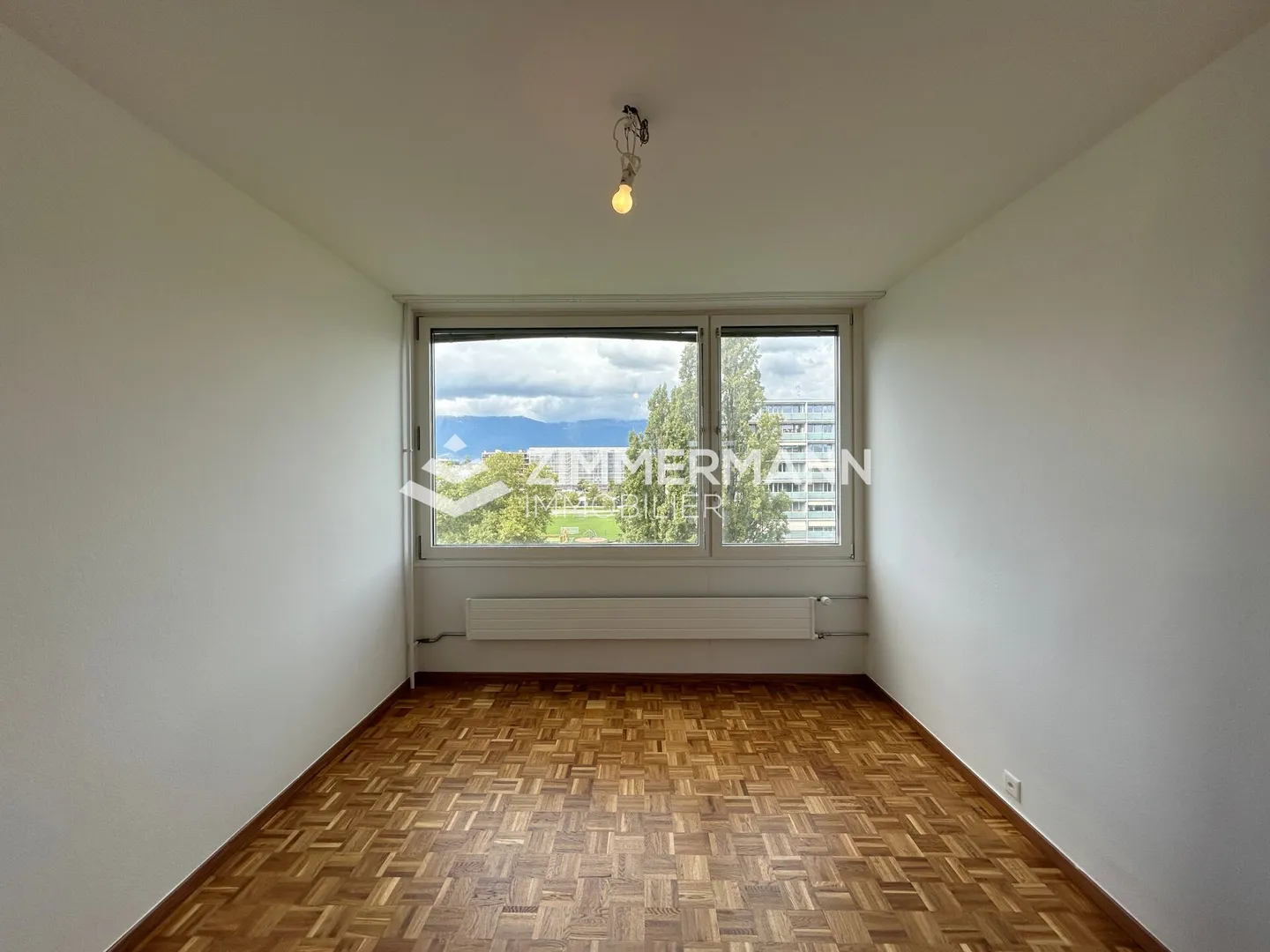 Spacieux 5 pièces en étage élevé avec balcon à Meyrin - Photo 7 sur 8