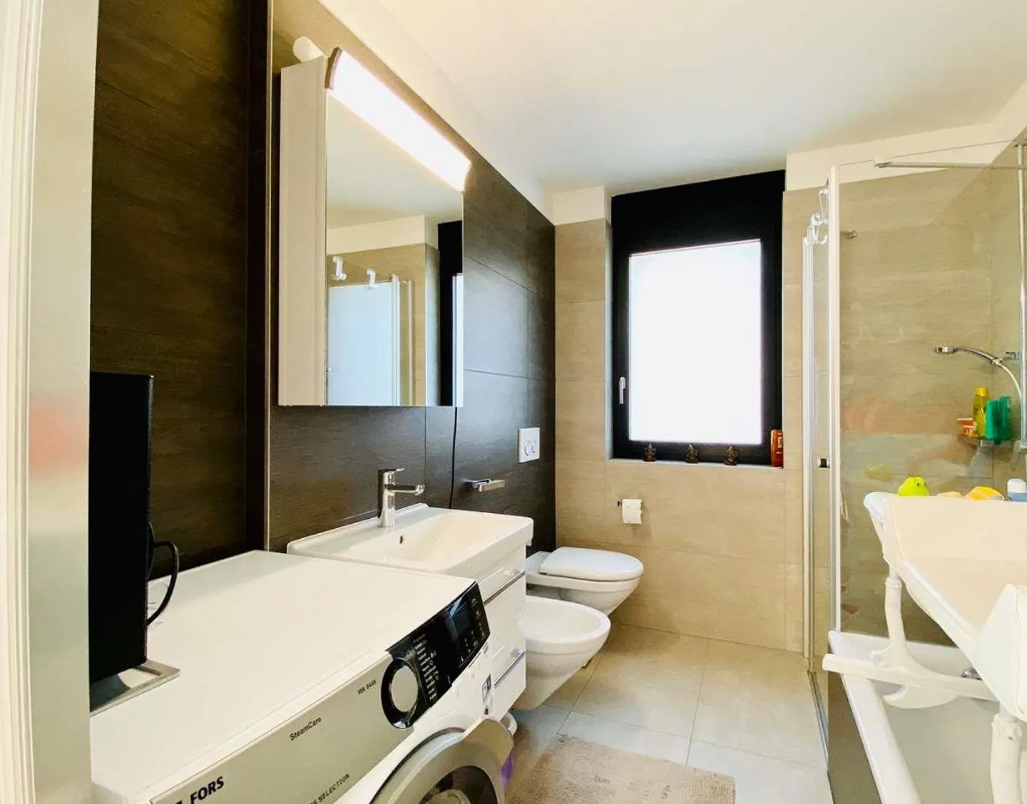 Nous louons un appartement lumineux de 3,5 pièces à Davesco - Photo 13 sur 13