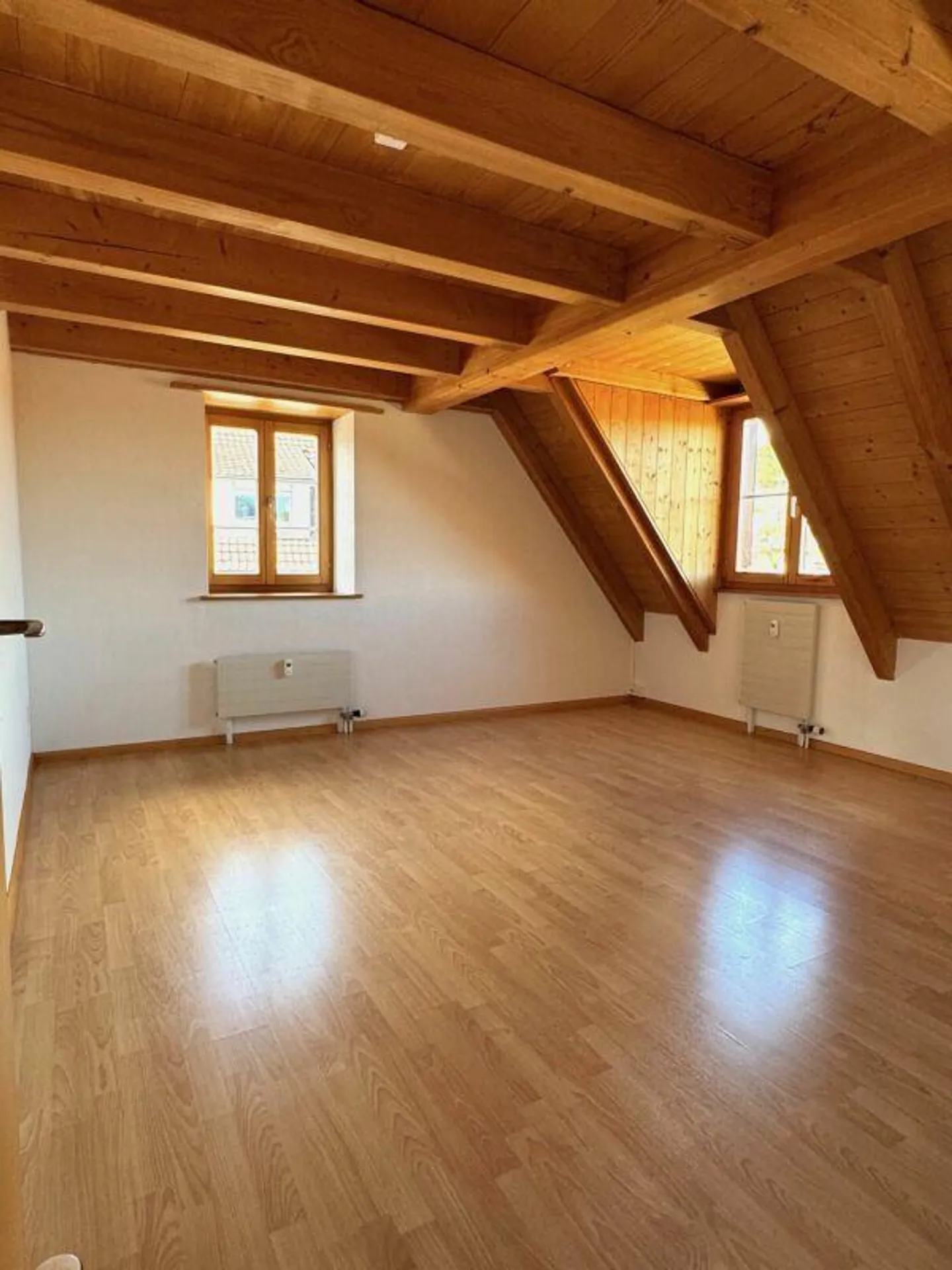 Maisonette penthouse in a 6-party house in the village center - Photo 9 of 12