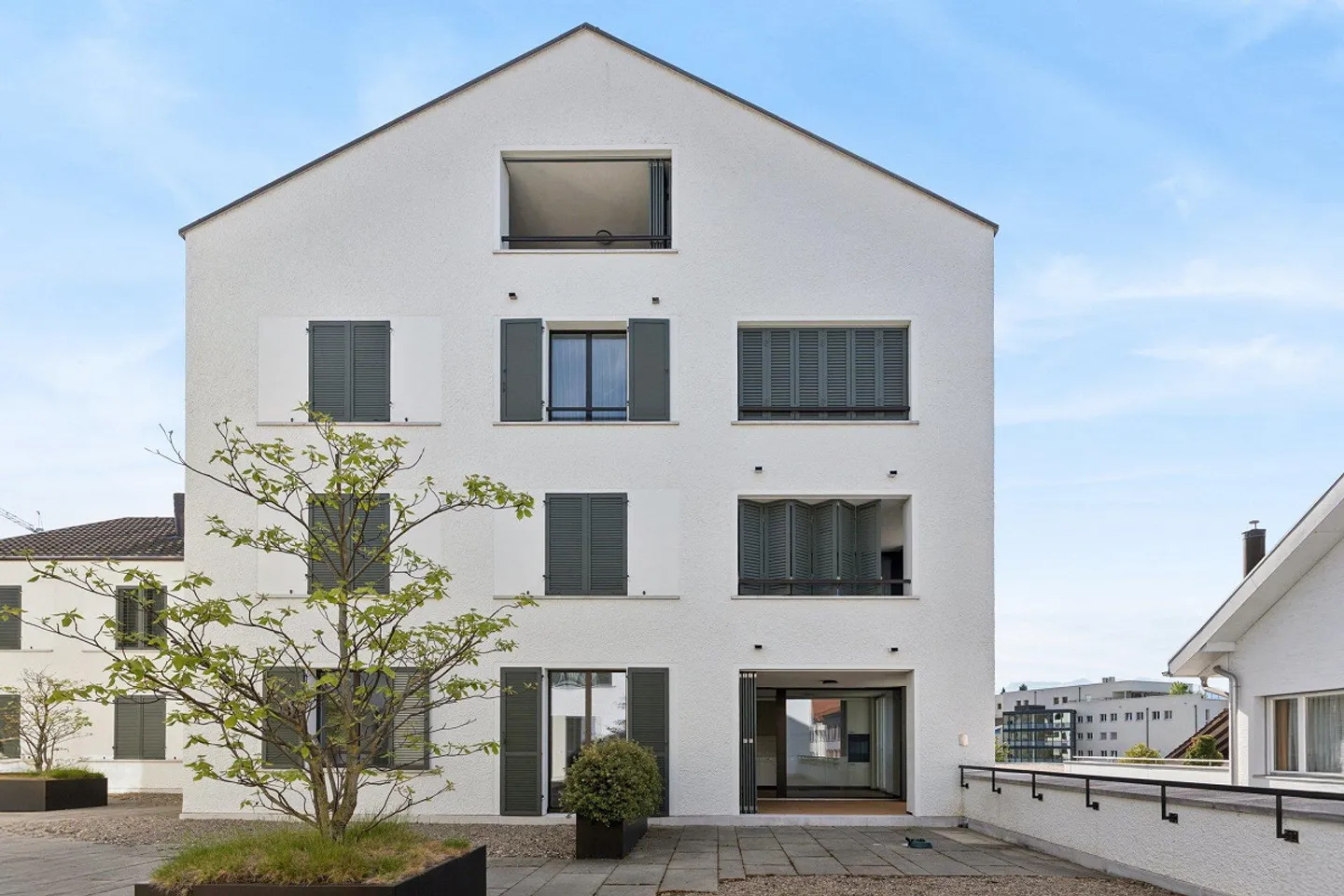 Modern Apartment with Green View - Photo 1 of 10