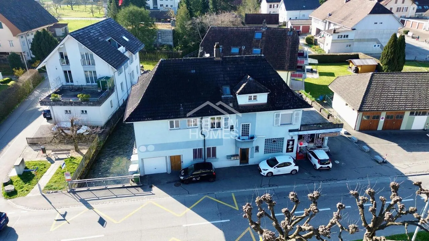 Combinaison attrayante de logement et de commerce - Photo 2 sur 13