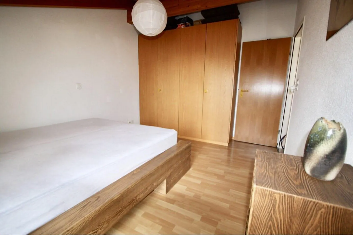 Incantevole appartamento mansardato di 3,5 locali con camino e balcone - Foto 3 di 11