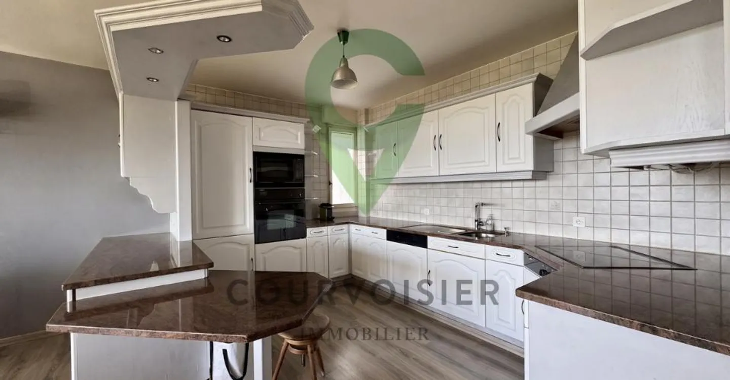 Appartement lumineux avec vue - Photo 3 sur 12