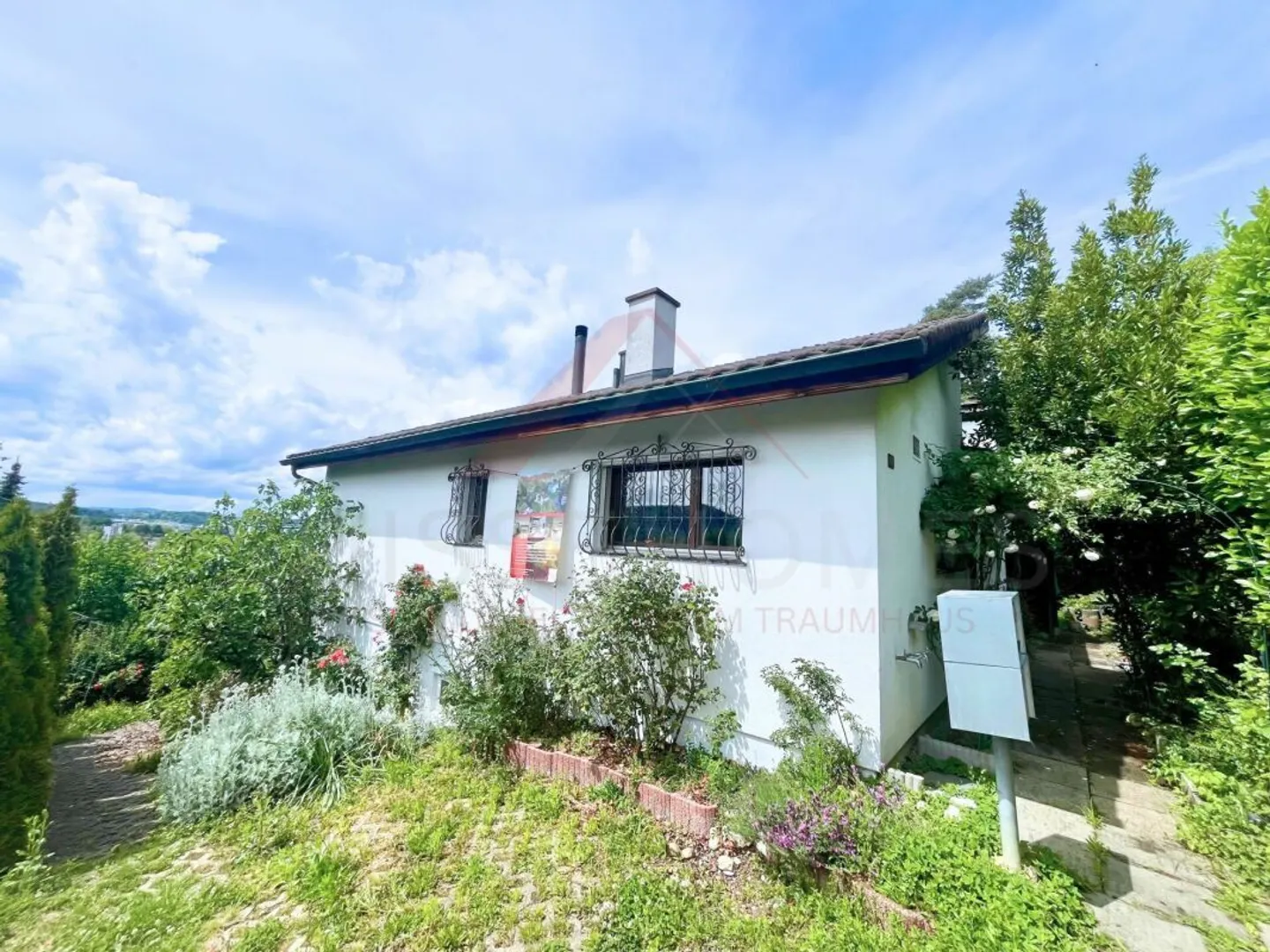 Maison individuelle de 8½ pièces avec appartement et vue de rêve à Dornach - Photo 2 sur 10