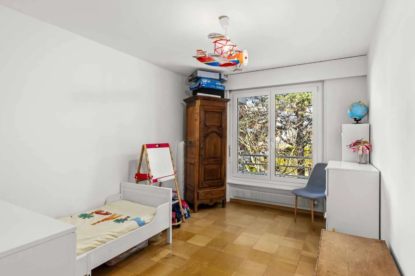 Appartement spacieux dans un environnement calme et verdoyant - Photo 4 sur 7