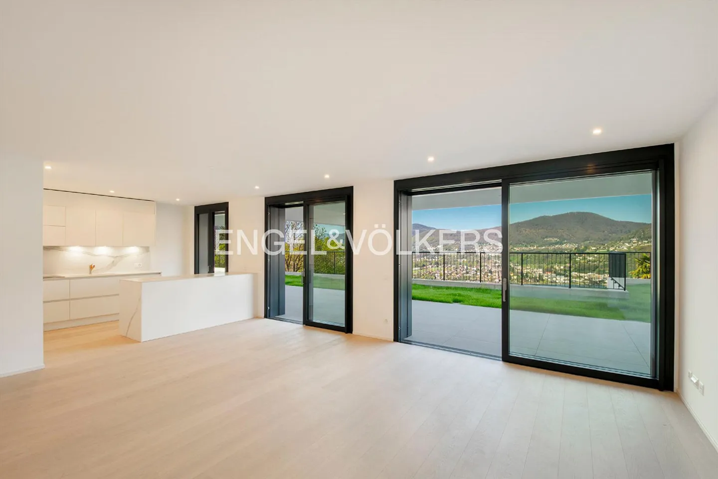 Appartamento di nuova costruzione con giardino e vista lago - Foto 4 di 13