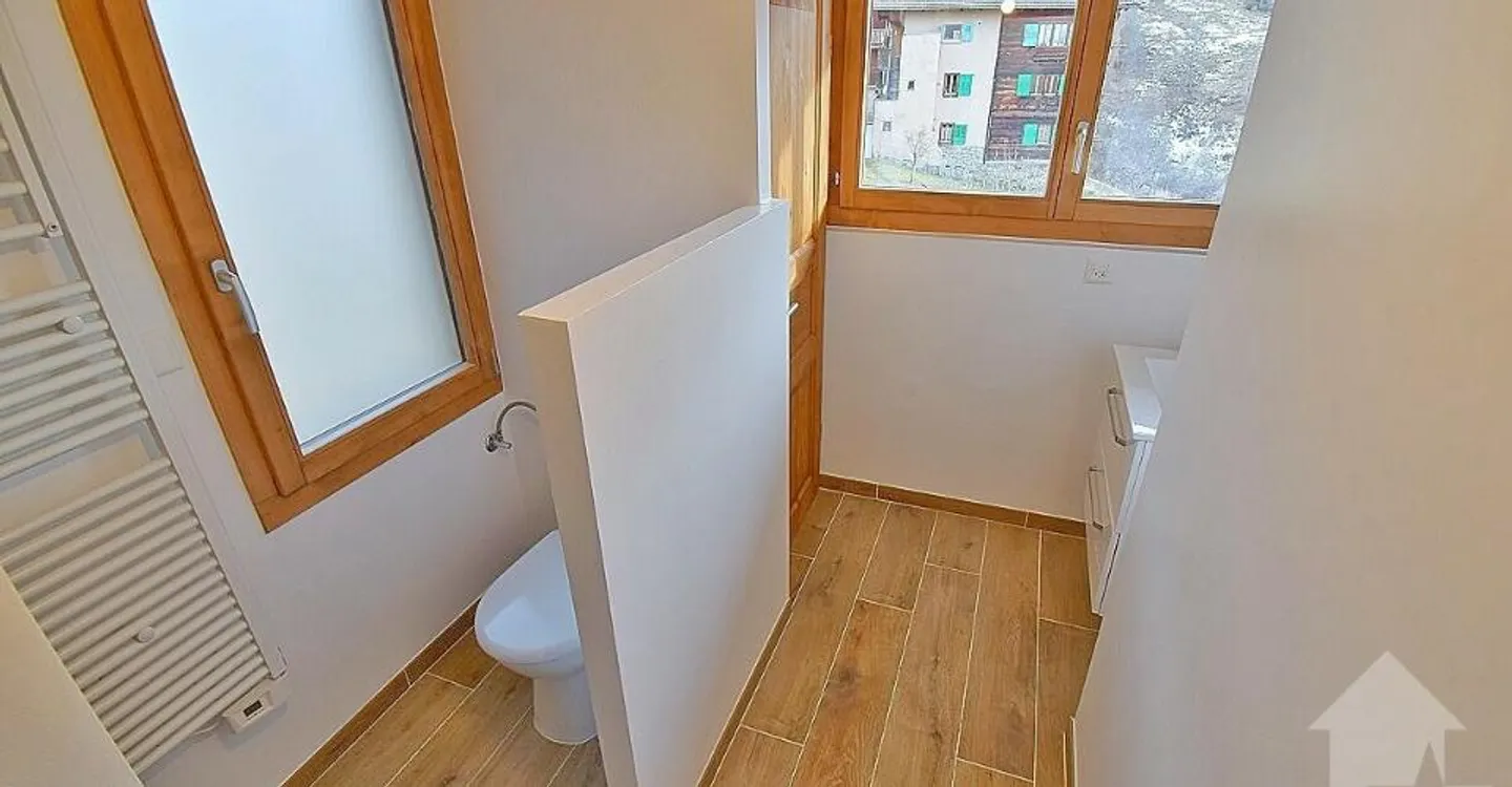 Magnifique appartement de 3.5 pièces complètement rénové en 2024 - Photo 10 of 11
