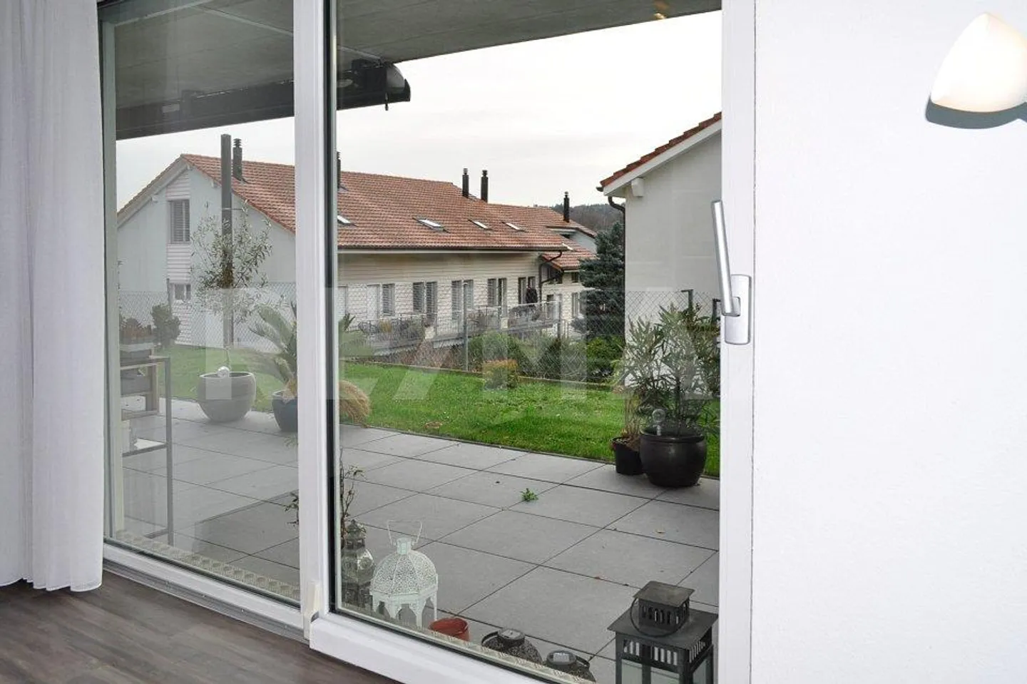 Newly built condominium with garden seating area - Photo 11 of 13