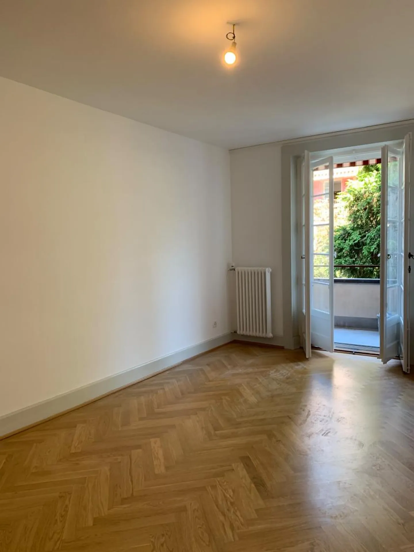 Bel appartement rénové offrant un environnement lumineux et spacieux, idéal pour une famille - Photo 11 sur 13