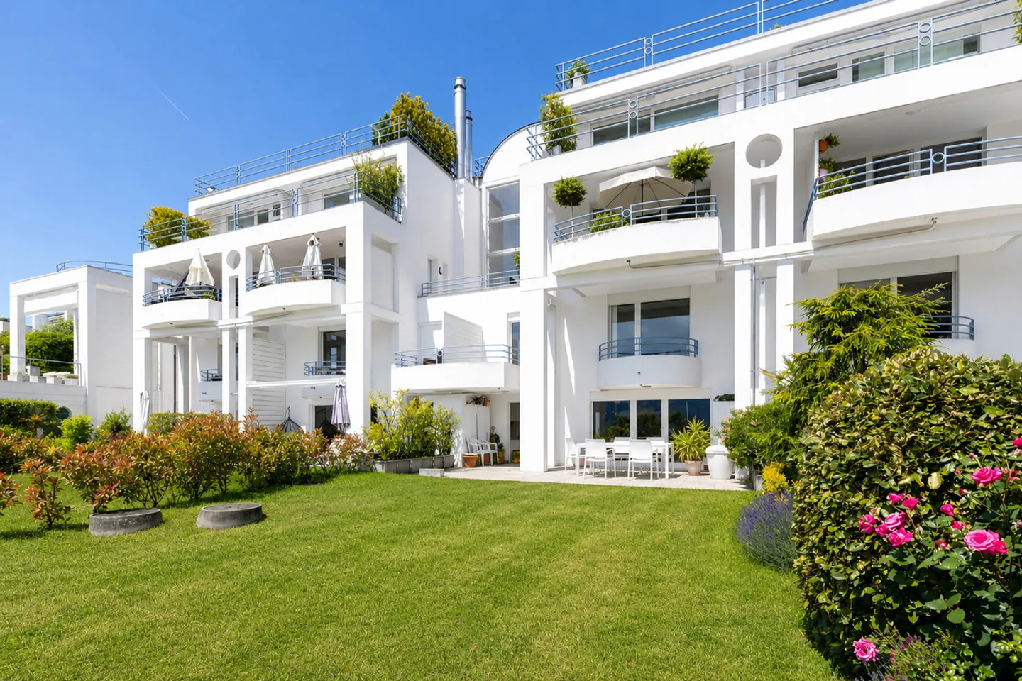 Gartengeschoss-Duplex mit Seeblick - Foto 3 von 12