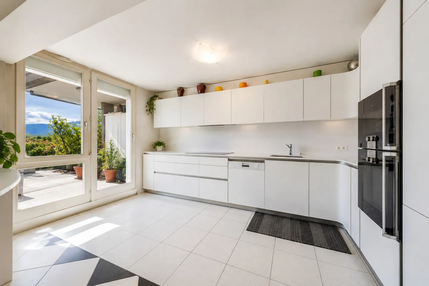 Gartengeschoss-Duplex mit Seeblick - Foto 6 von 12