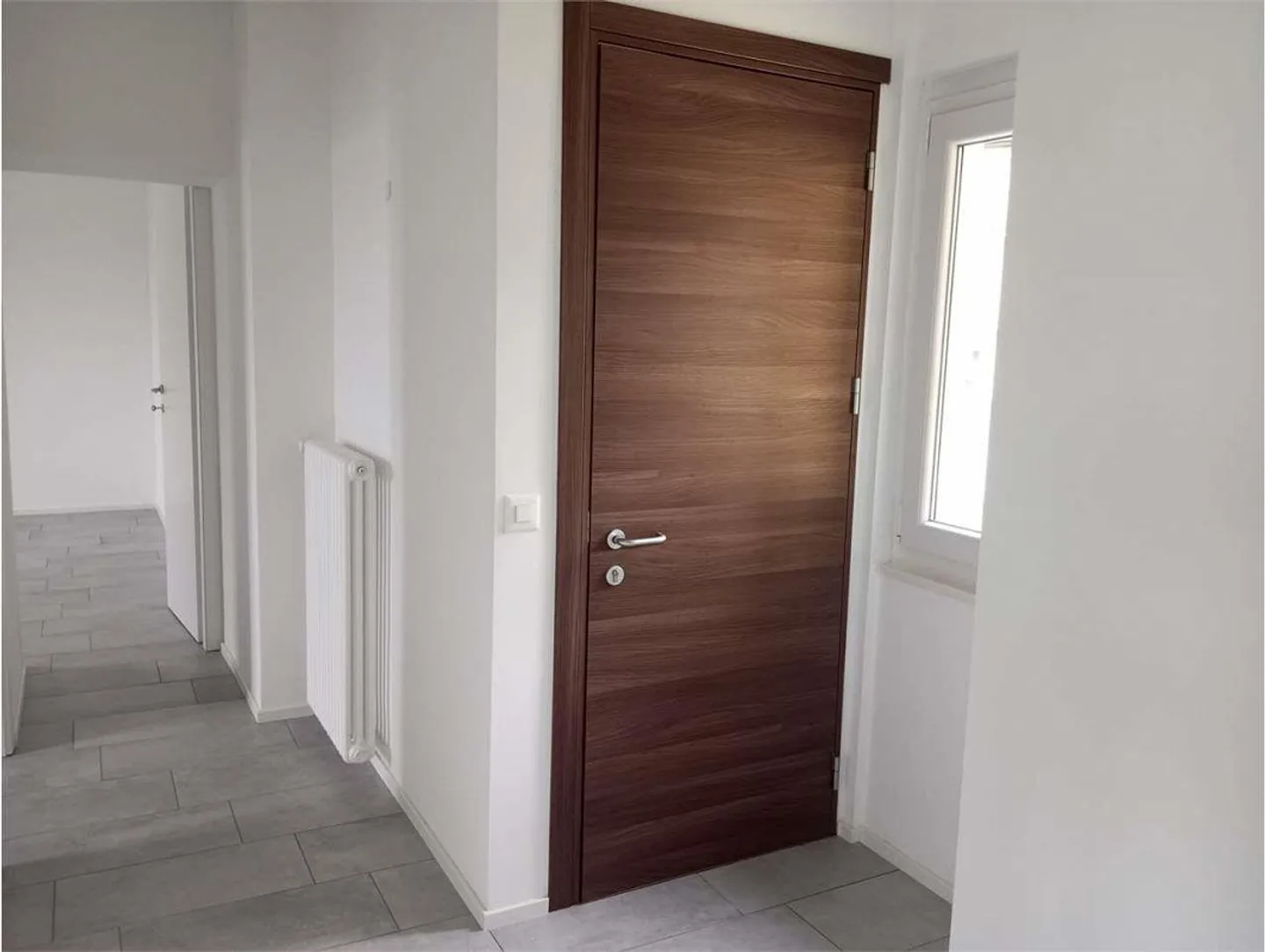 MODERNE 3.5-ZIMMER-WOHNUNG IN MORBIO INFERIORE - Foto 9 von 10