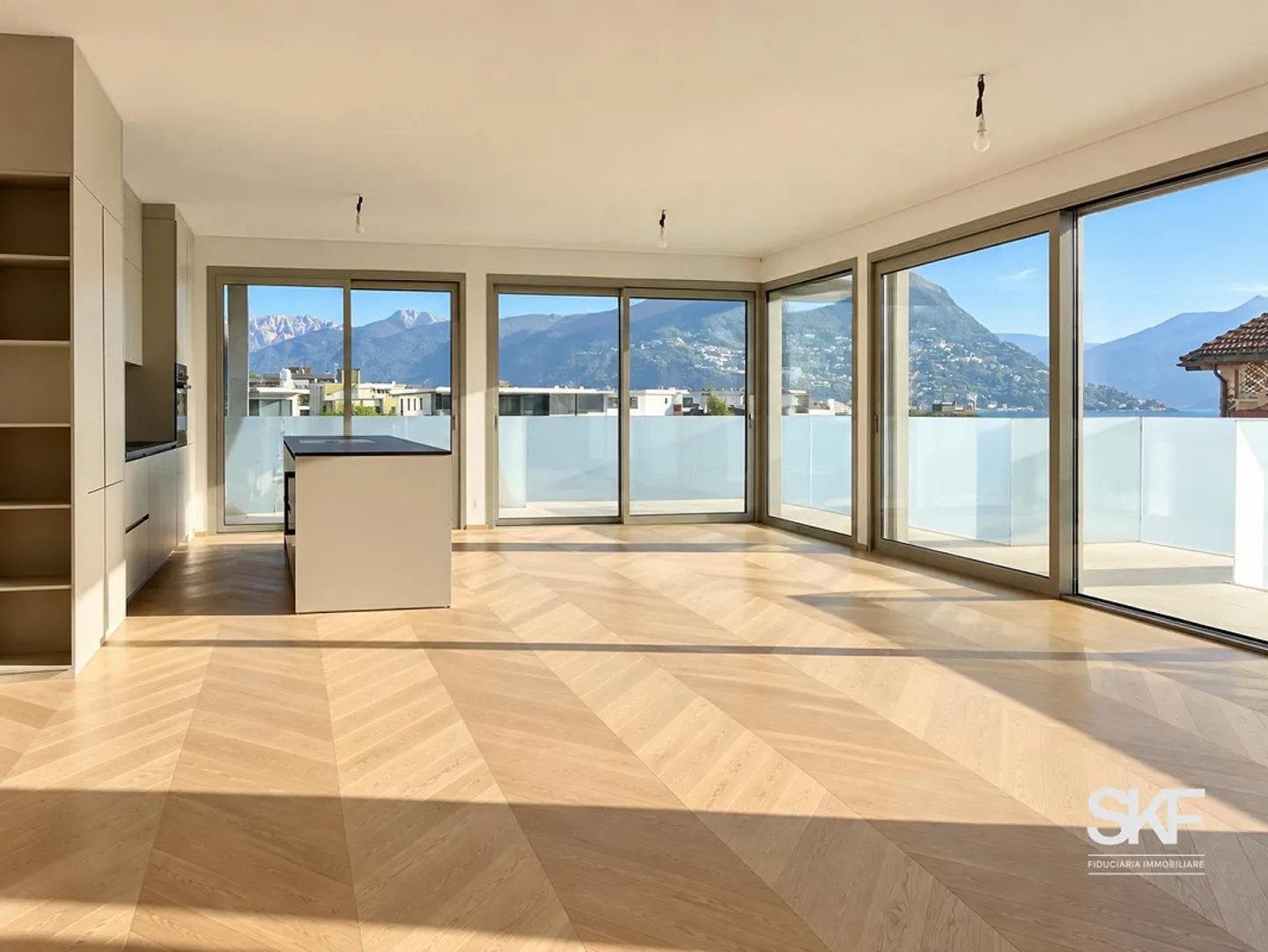 MASSAGNO - À VENDRE PENTHOUSE NEUF AVEC TERRASSE VUE SUR LE LAC - Photo 3 sur 15