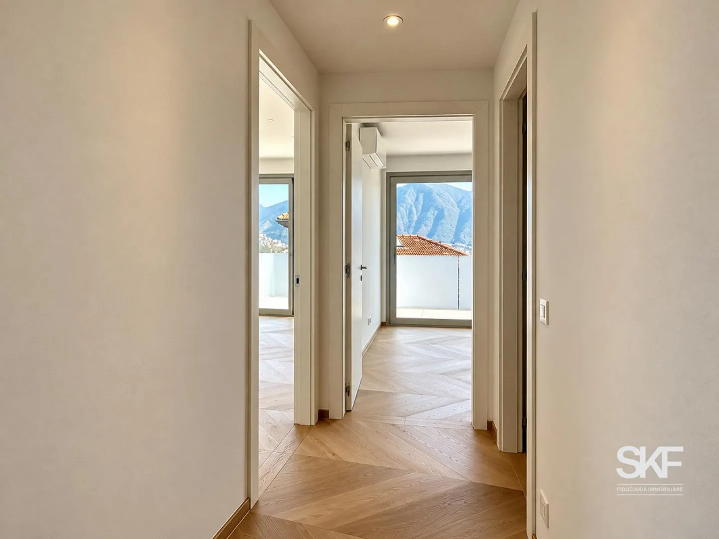 MASSAGNO - À VENDRE PENTHOUSE NEUF AVEC TERRASSE VUE SUR LE LAC - Photo 6 sur 15
