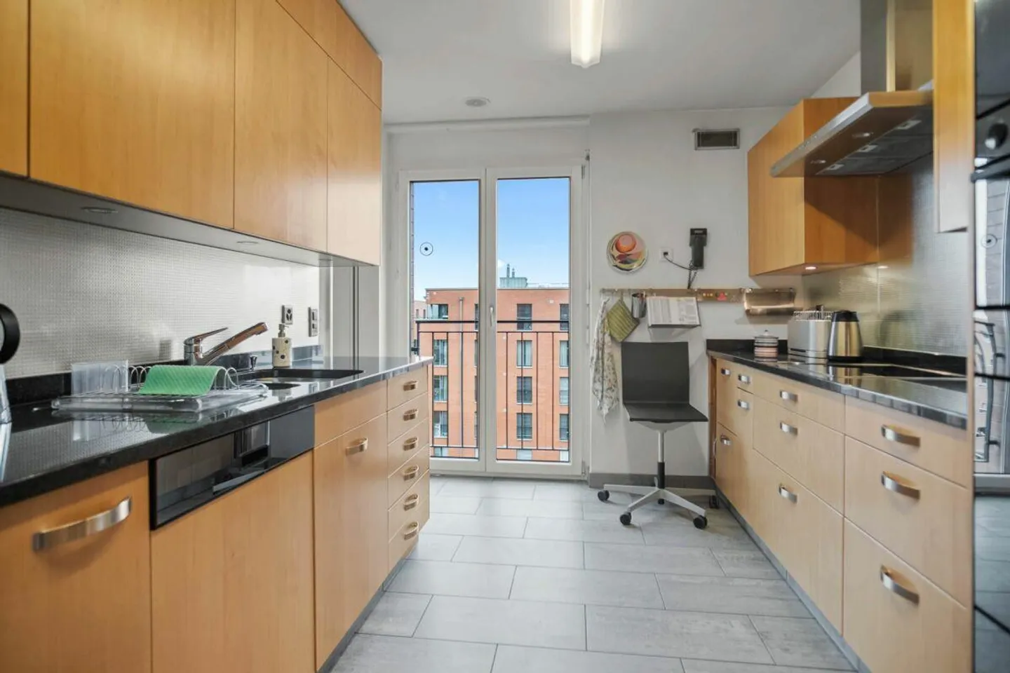 Living Above the Rooftops: Your Penthouse with a View - Photo 3 of 26