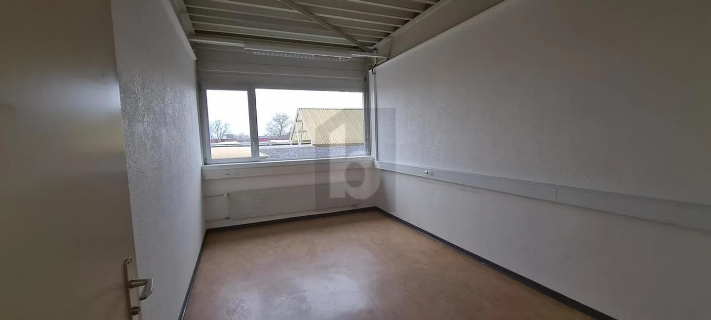 SPACIOUS, IN INDUSTRIAL AREA - Photo 1 of 5