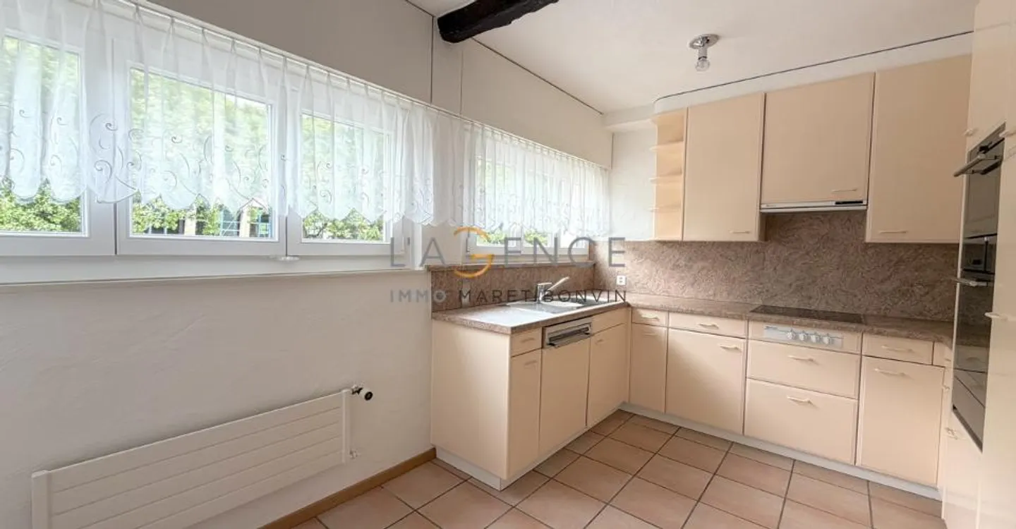 Charming 5.5-room apartment with balcony, unobstructed view and garden - Photo 2 of 9