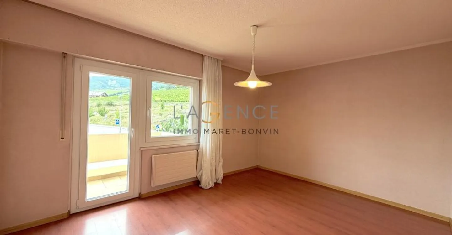 Charming 5.5-room apartment with balcony, unobstructed view and garden - Photo 4 of 9