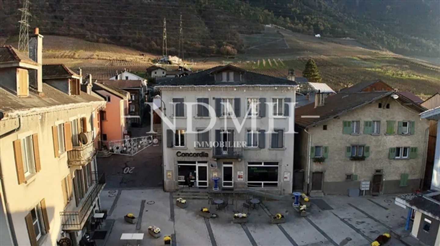 Mixed-Use Building for Sale in the Village Center - Photo 1 of 5