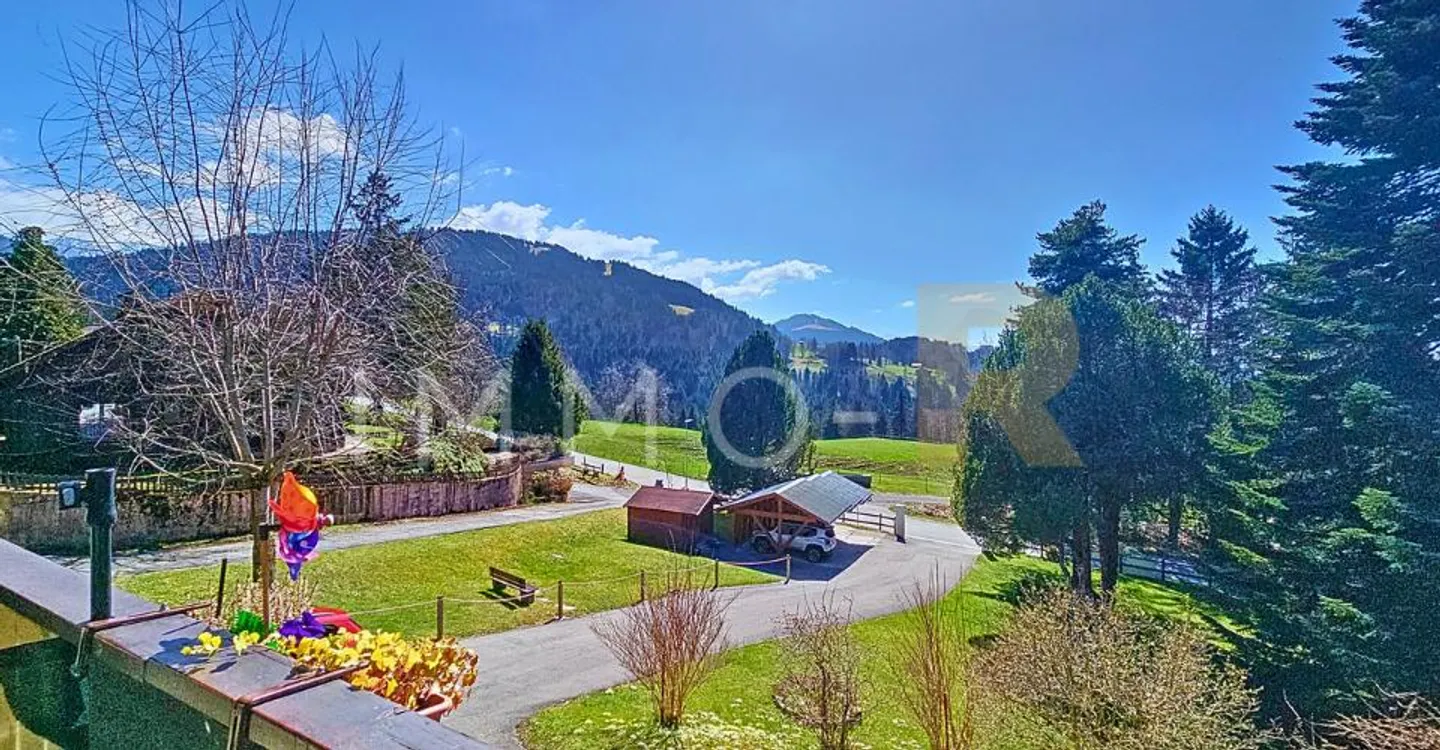 Charmante 5,5-Zimmer-Wohnung in einem Chalet - Foto 4 von 10