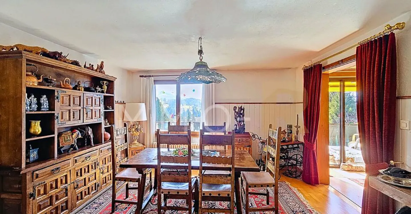 Charmante 5,5-Zimmer-Wohnung in einem Chalet - Foto 5 von 10