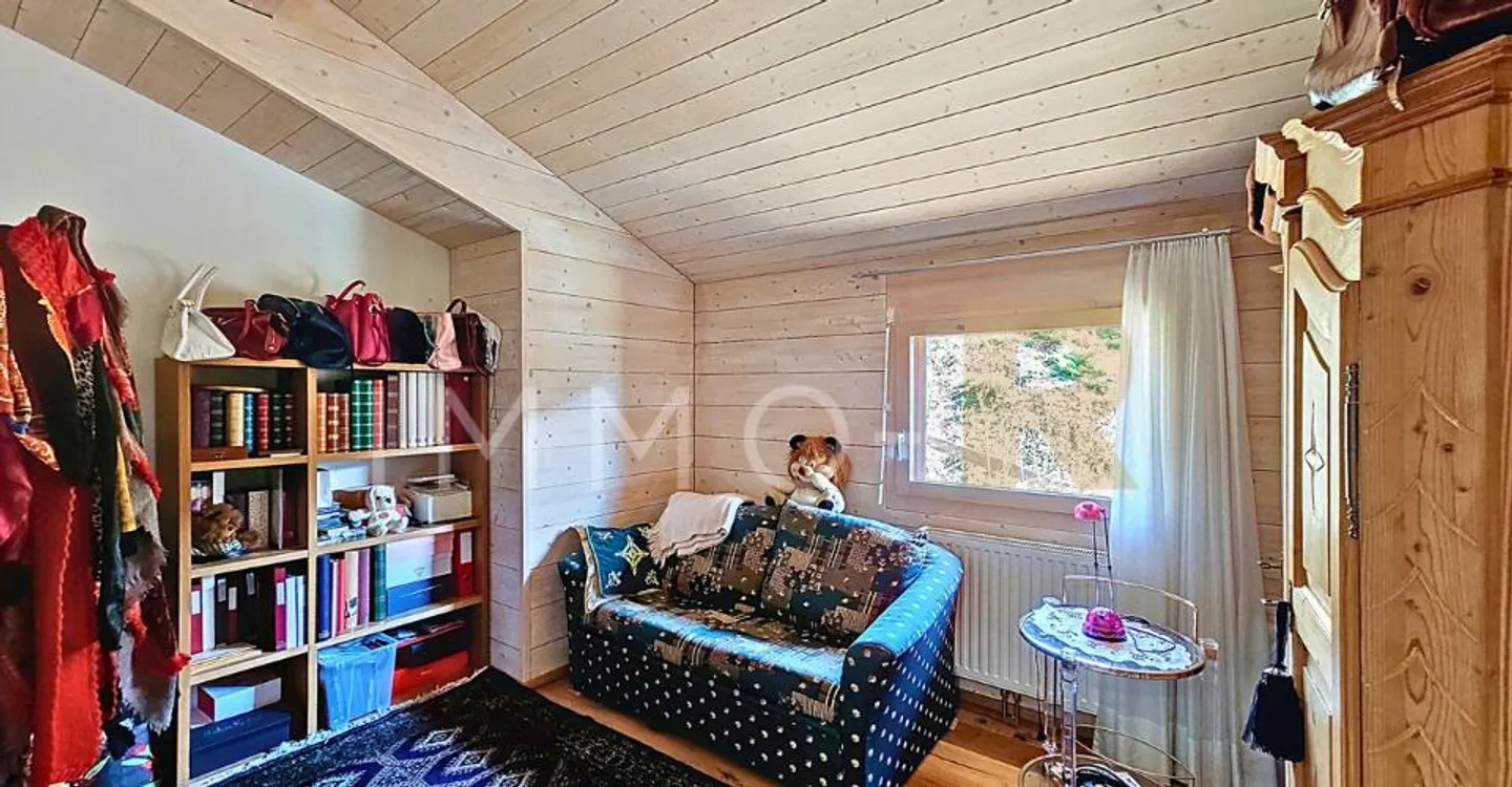 Charmante 5,5-Zimmer-Wohnung in einem Chalet - Foto 7 von 10