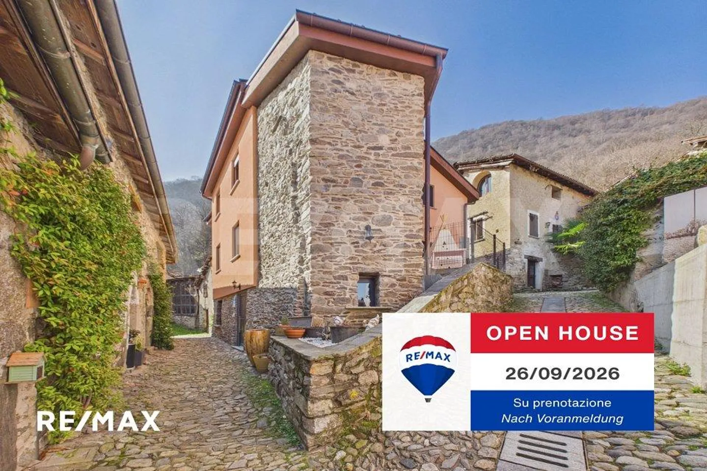 Spacious single-family home in the heart of Sigirino - Photo 1 of 13