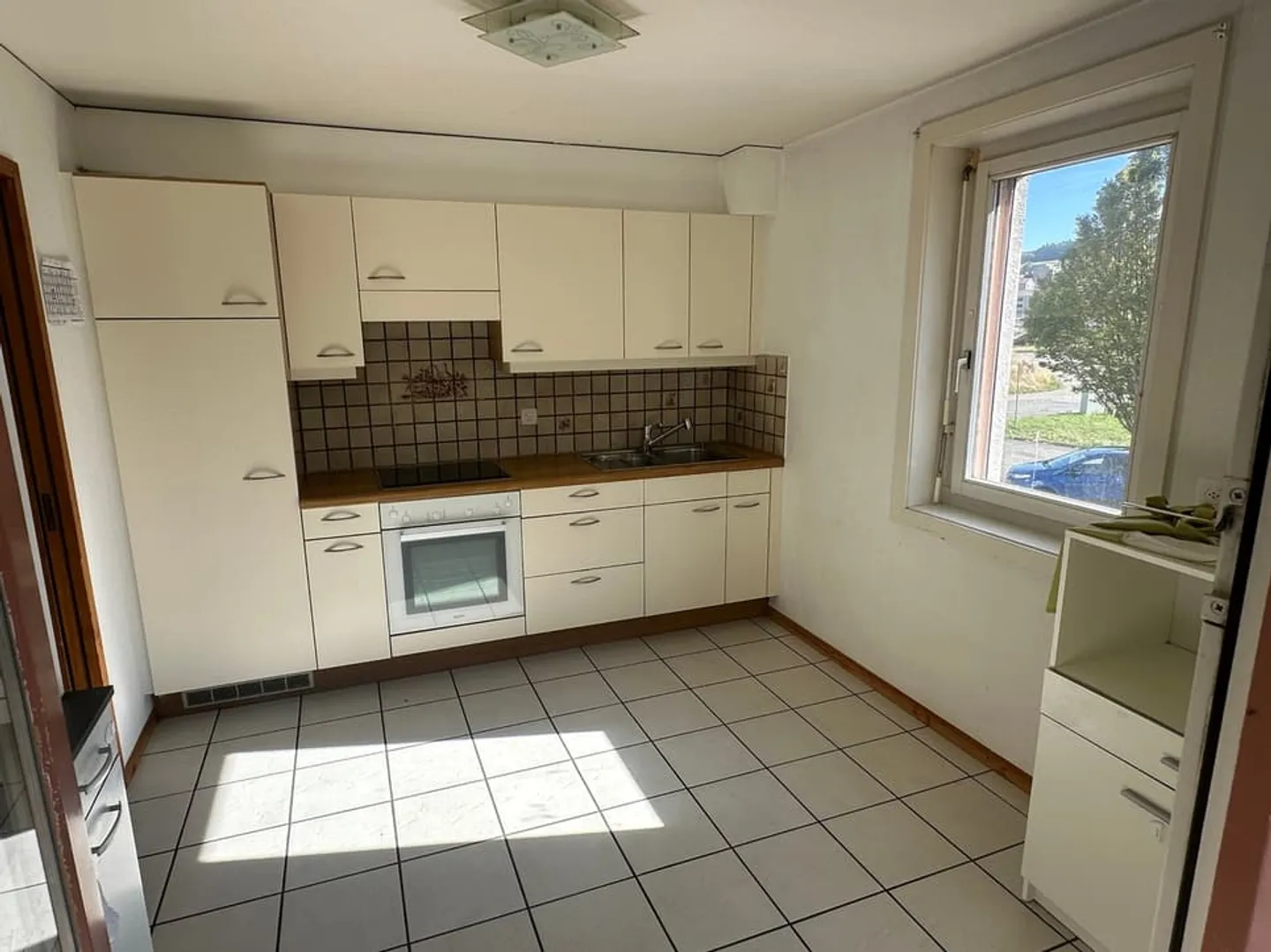 COURTEPIN 2.5 ROOMS OF 61.4M², COVERED BALCONY, UNDERGROUND PARKING, CELLAR - Photo 4 of 8