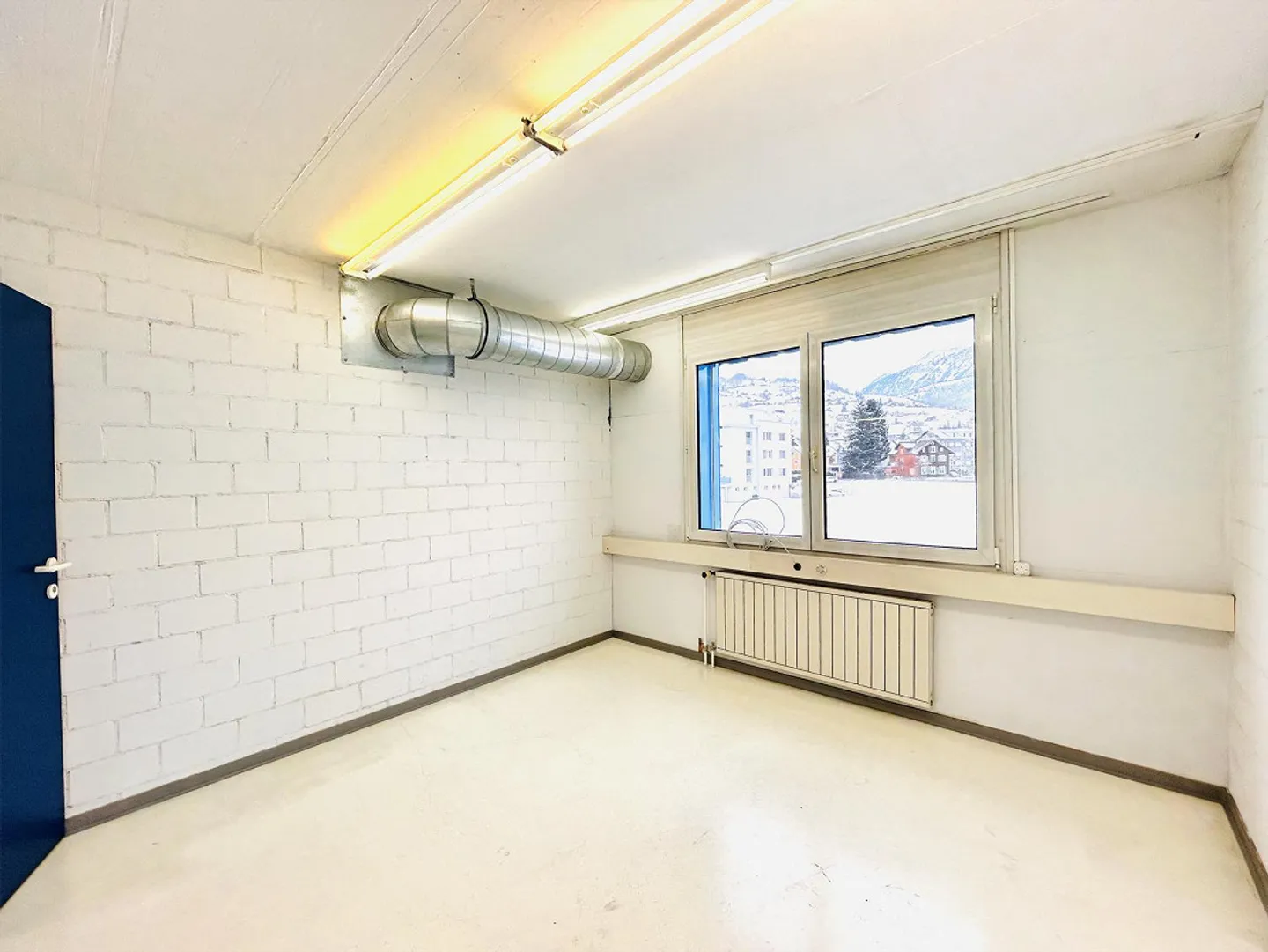 Vielseitiges Gewerbegebäude - Foto 10 von 21
