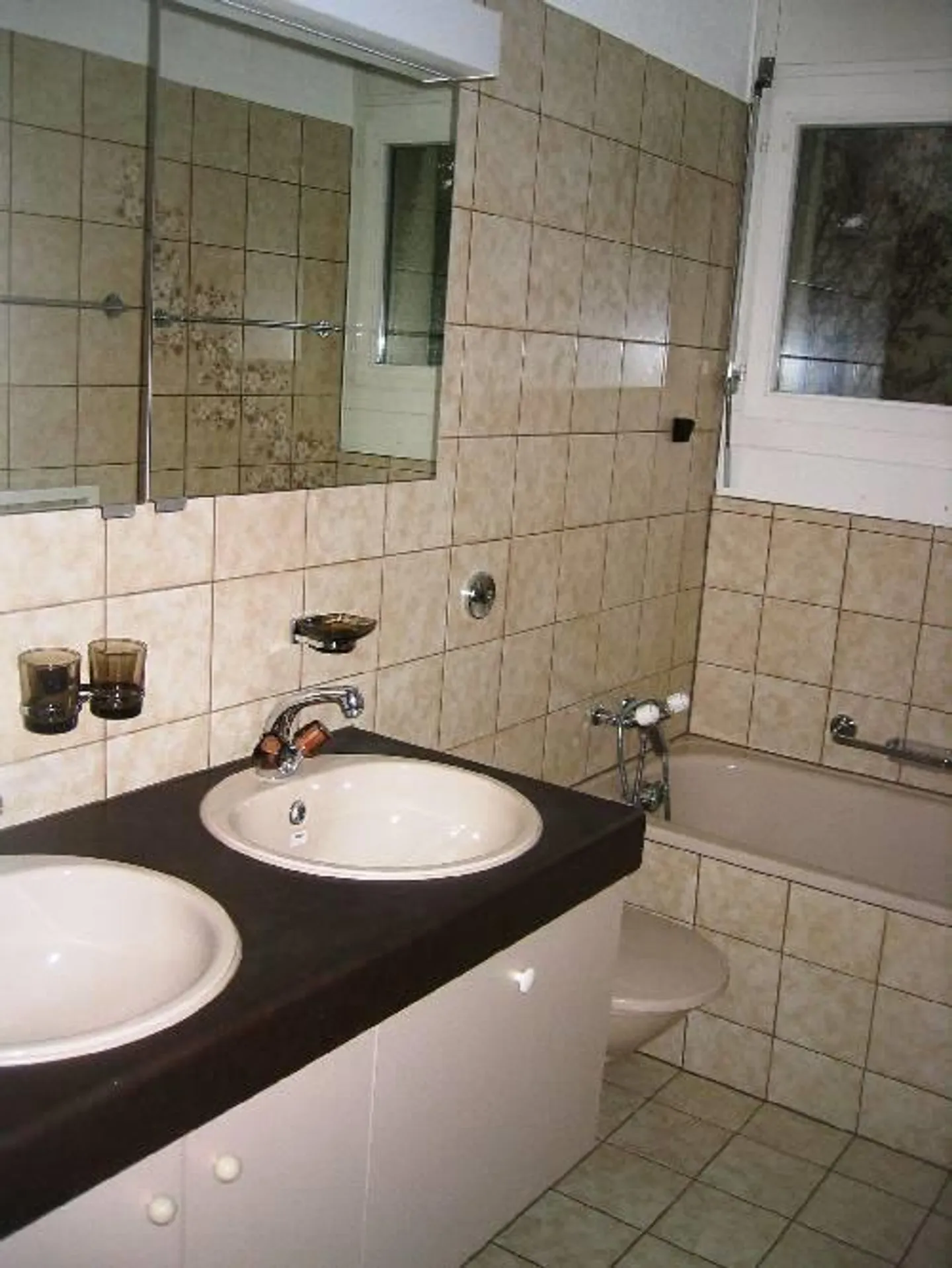 Appartement spacieux en zone calme - Photo 3 sur 4