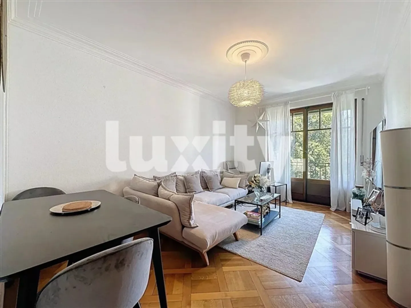 Charmante Wohnung in Eaux-Vives - Foto 2 von 3