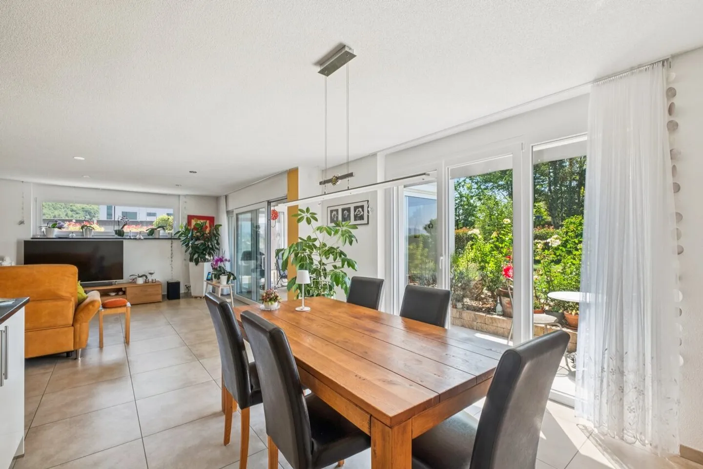 Moderne Gartenwohnung mit Wintergarten - Foto 4 von 10