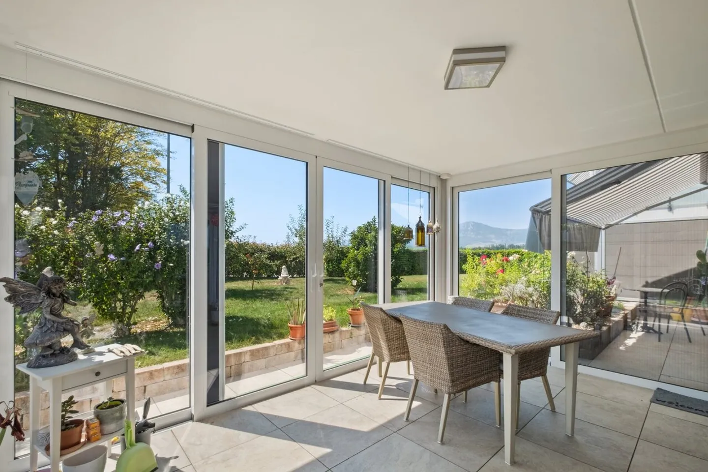 Moderne Gartenwohnung mit Wintergarten - Foto 1 von 10