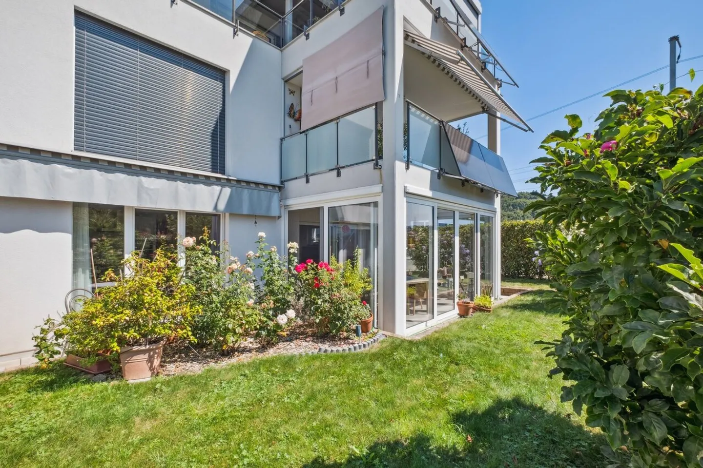 Moderne Gartenwohnung mit Wintergarten - Foto 2 von 10