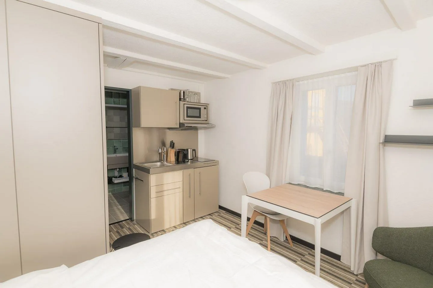 Furnished studio with kitchen in a central location in Kriens - Photo 1 of 9