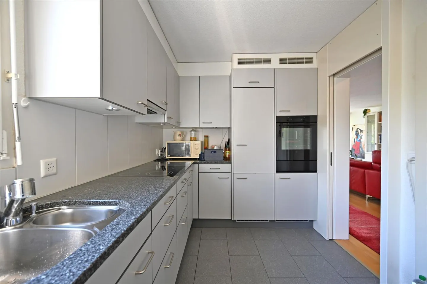 Appartamento 4.5 stanze in un quartiere tranquillo con garage - Foto 6 di 12
