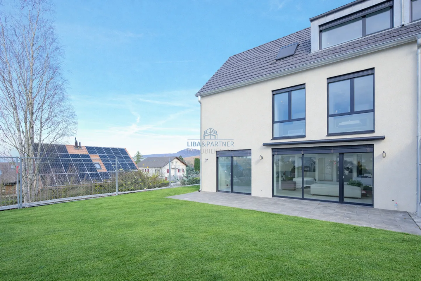 Architectural Duplex in Pfeffingen - Photo 1 of 13